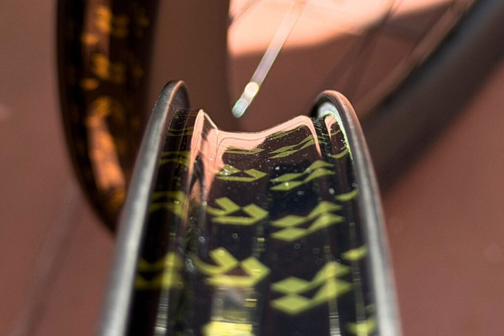 Reserve 57|64 Turbulent Aero carbon fiber rim interior showing semi-hooked bead and carbon weave detail