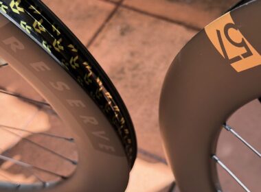 Reserve 57|64 Turbulent Aero deep section carbon wheelset with gold Reserve branding and 64mm rear rim profile
